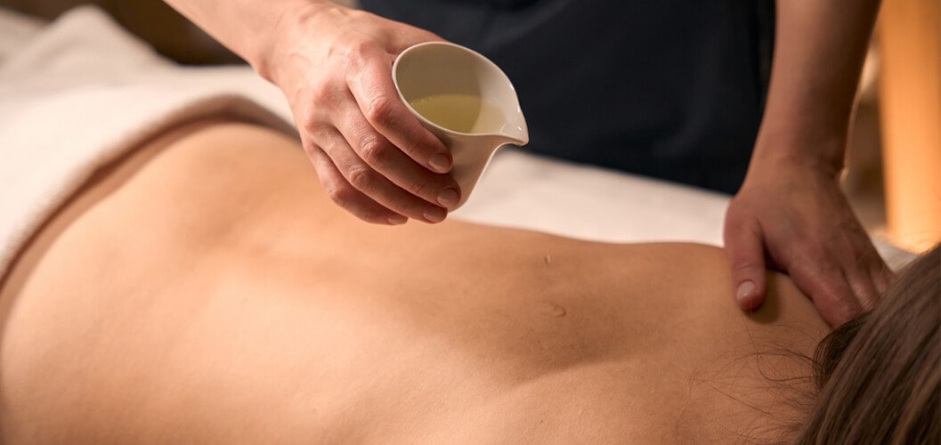 Snehana oil therapy at Santhimandiram